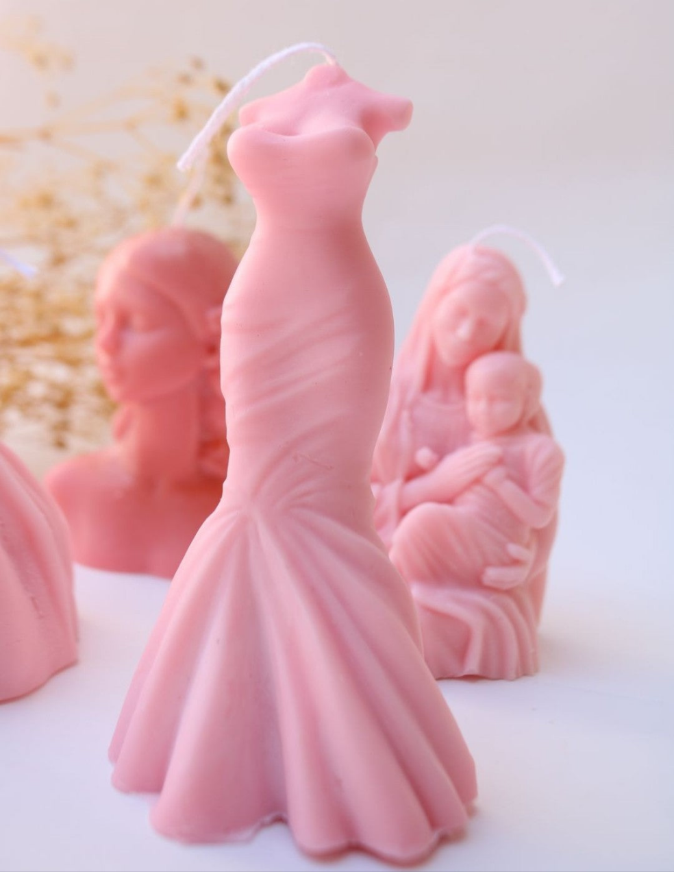 Juego de velas perfumadas con opción de vela decorativa.